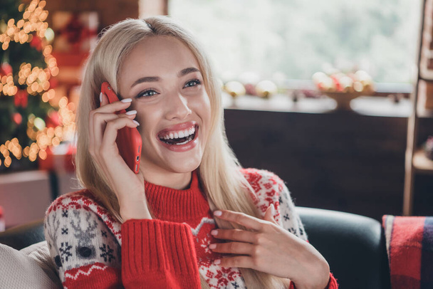 Portrait of attractive cheerful girl talking on phone laughing spending day eve time at decorated home loft industrial interior indoors - Photo, image