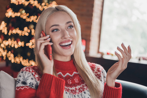 Portrait of attractive cheerful girl talking on phone chatting congratulating friends at modern loft industrial style indoors - Фото, изображение