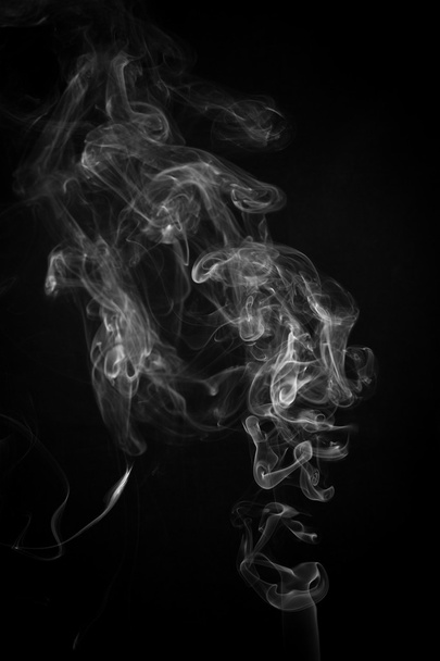 Abstract smoke moves on a black background - Foto, afbeelding