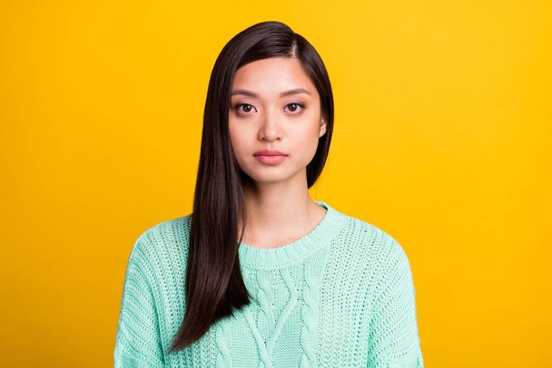 Photo of pretty charming young lady wear turquoise sweater isolated yellow color background - Valokuva, kuva