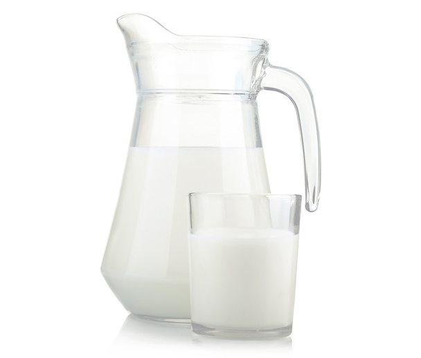 Jug and glass of milk isolated - 写真・画像
