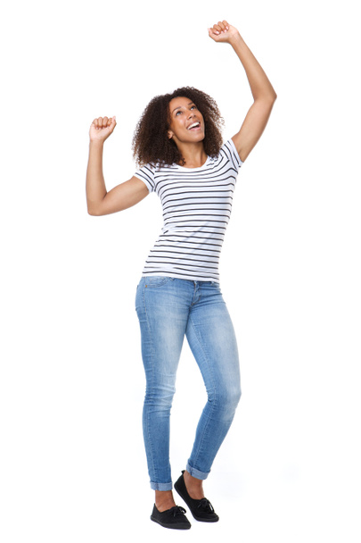 Весела молода жінка з піднятими руками
 - Фото, зображення