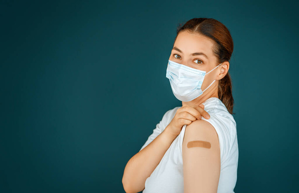 Young woman after vaccination. Virus protection. COVID-2019. - Fotoğraf, Görsel