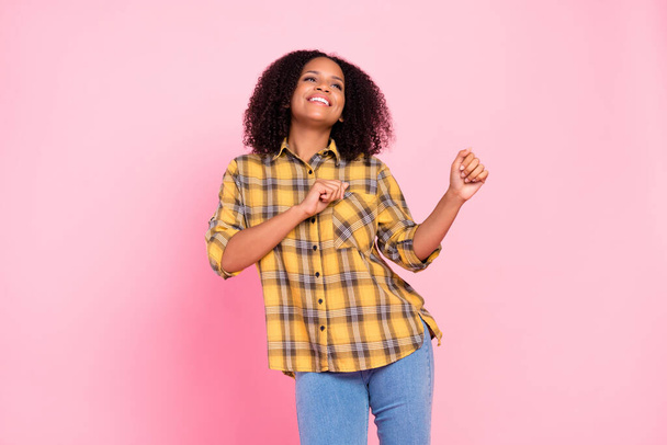 Photo of carefree dreamy lady dance move look empty space wear plaid shirt isolated pink color background - Valokuva, kuva