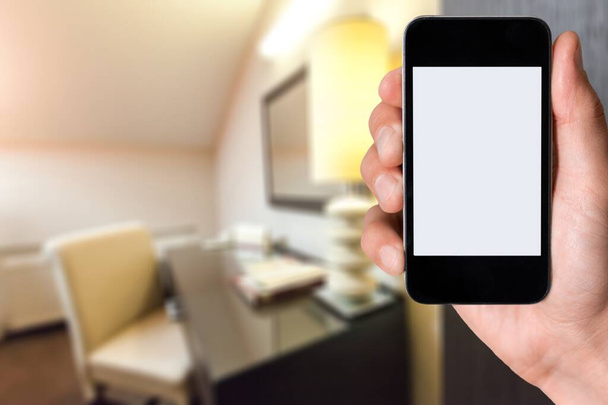 hand holding smartphone with blank screen - Foto, Bild