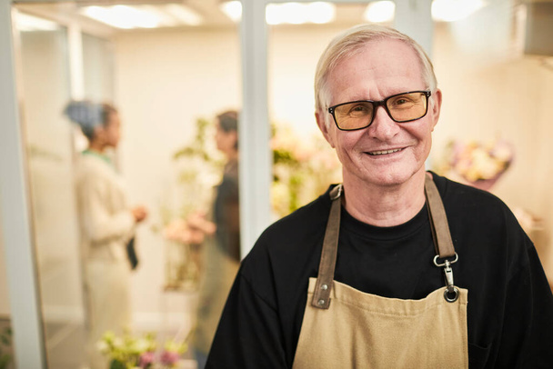 Senior Man Working in Flower Shop - Photo, Image