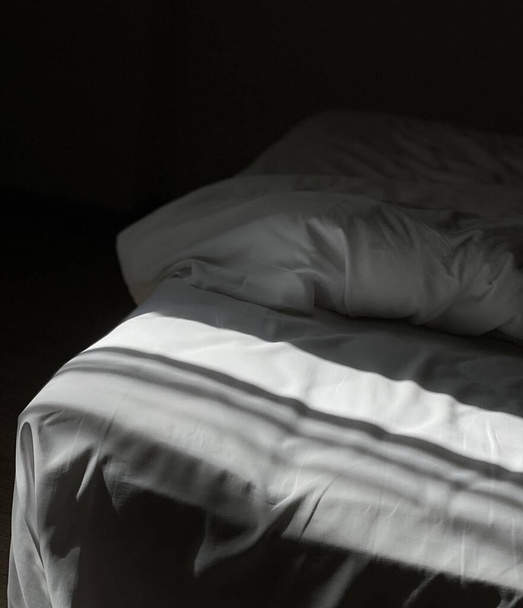 white pillow on a black background - Foto, Imagem