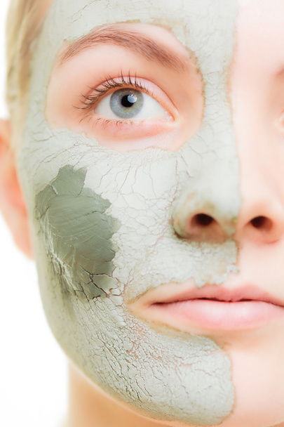 Woman in clay mud mask on face - Fotoğraf, Görsel