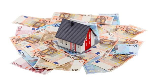 House and euro banknotes isoalted on white background - Φωτογραφία, εικόνα