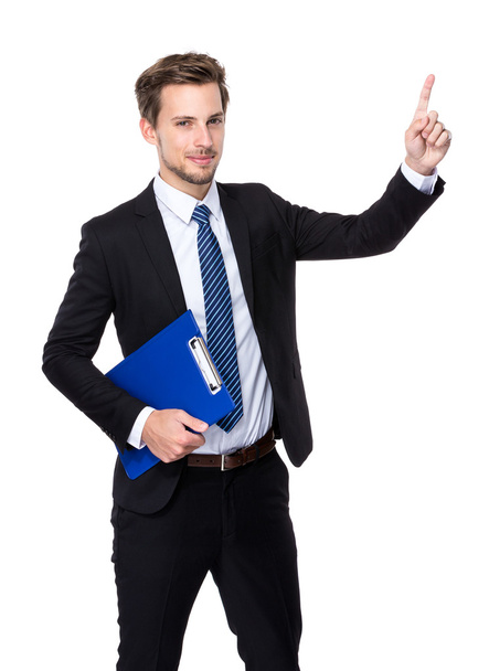 Businessman with clipboard and finger point out - 写真・画像