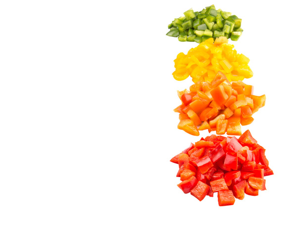 σωρούς των ψιλοκομμένες πολύχρωμες πιπεριές - Φωτογραφία, εικόνα