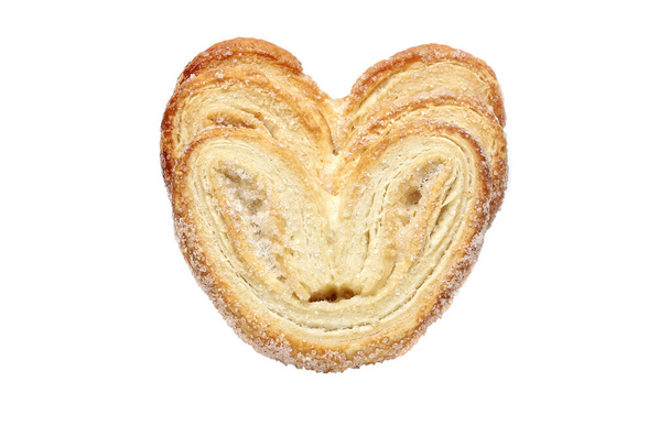 Puff pastry cookies in the form of hearts on a white background - Fotó, kép