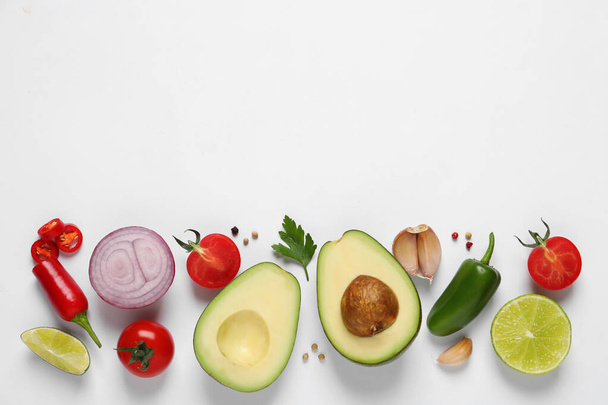 Fresh ingredients for guacamole on white background, flat lay - Фото, зображення
