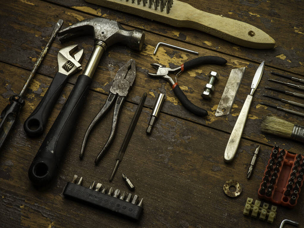 Old tools over a wood background - Φωτογραφία, εικόνα