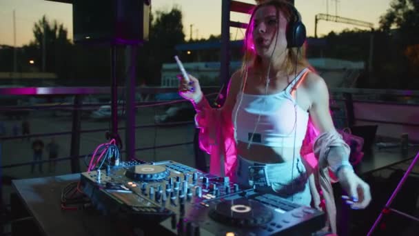 beautiful dj woman playing music at glamorous party celebration dance enjoying fancy social event wearing stylish fashion dancing performing live in club at night 4k footage. - Footage, Video
