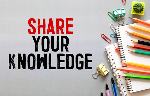 Share Your Knowledge text written on a notebook with pencils. - Photo, Image