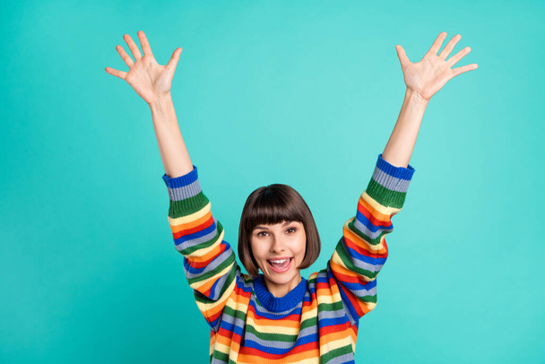 Photo portrait smiling bob haired woman amazed wearing striped pullover isolated bright teal color background - Fotó, kép