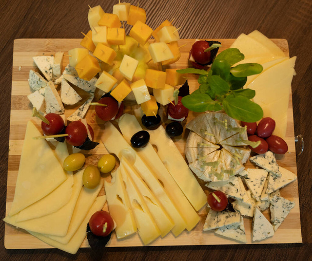 assorted cheeses on a plate - Photo, Image