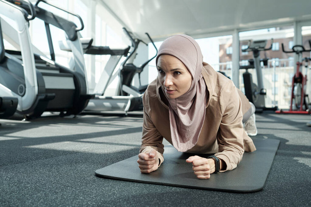 Sporty Muslim Woman Doing Plank - Photo, Image