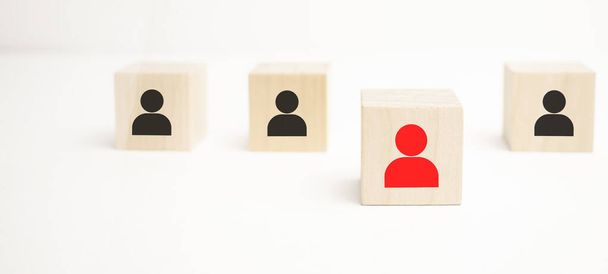Social distance COVID-19, Human resource management and recruitment business concept. Wooden cube blocks are different with human icons, red, prominent crowds - Foto, Imagen