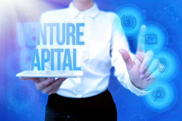 Text sign showing Venture Capital. Word for capital invested in a project in which there is risk Lady In Uniform Holding Phone Virtual Press Button Futuristic Technology. - Photo, Image
