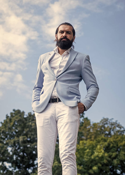 his perfect style. bride groom outdoor. groomed brutal hipster in stylish clothes. male beauty and fashion. confident businessman with beard and moustache. mature man in formal elegant suit - Fotó, kép