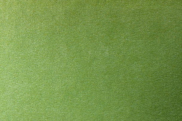 Dermantine substitute for natural leather green textured background close-up macro photography increased detail - Foto, imagen