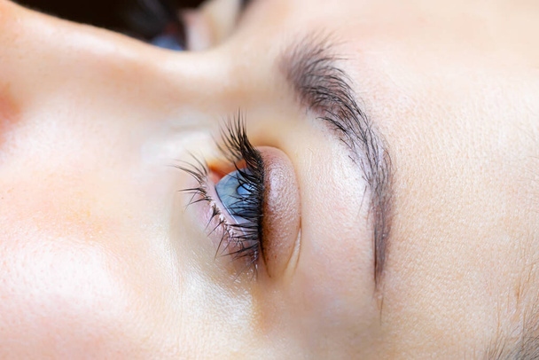 the result after performing permanent makeup of the eyelids and eyelashes - 写真・画像