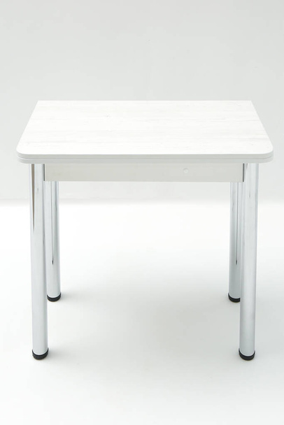 Classic wooden white kitchen table on white background. - Valokuva, kuva