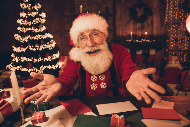 Photo portrait cheerful smiling santa wearing glasses headwear sweater laughing gesturing hands - Photo, image