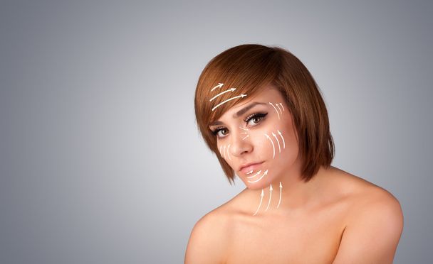 Beautiful girl with facial arrows on her skin - Foto, Imagen