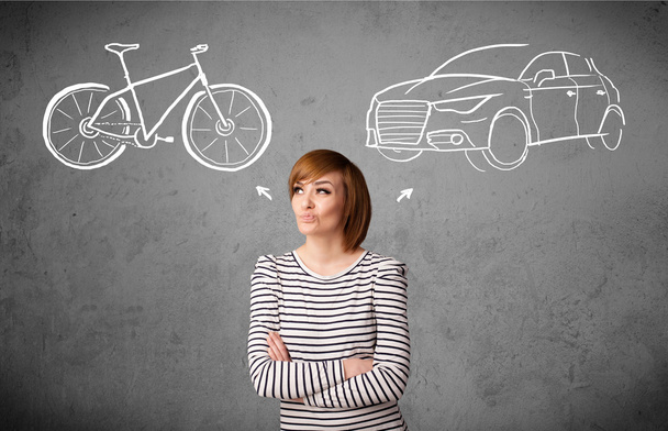 Жінка робить вибір між велосипедом і машиною
 - Фото, зображення