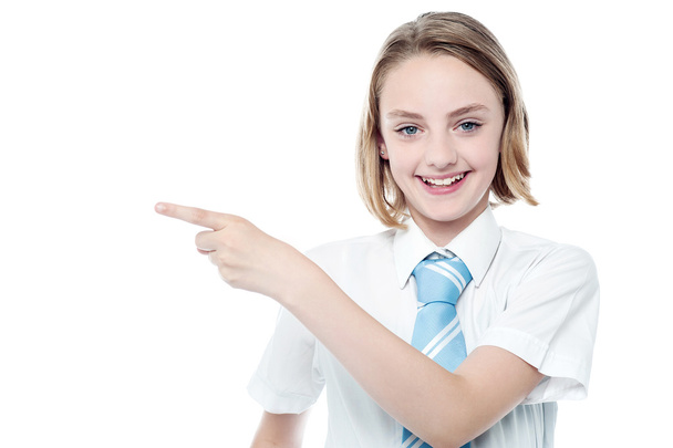 School girl pointing at something - Zdjęcie, obraz