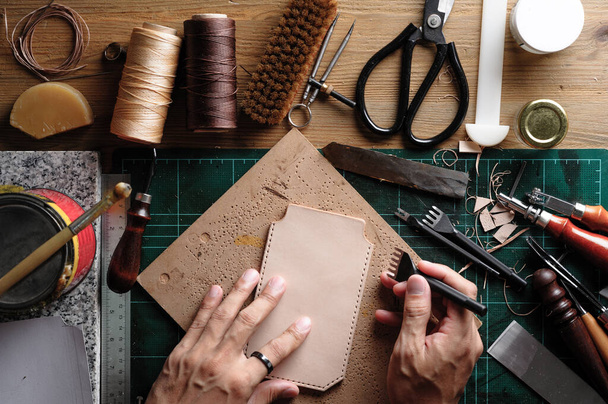 Working with vegetable tanned leather. Leather and the craft tools. - Фото, зображення