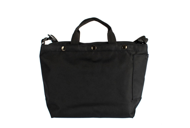Estúdio closeup isolado tiro de novo casual moderno elegante tecido saco preto bagagem bolsa com alça no fundo branco. - Foto, Imagem