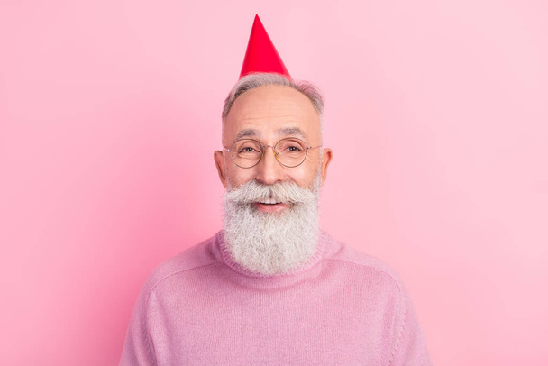Photo of positive grey beard hair senior man wear cap eyewear sweater isolated on pink background - 写真・画像