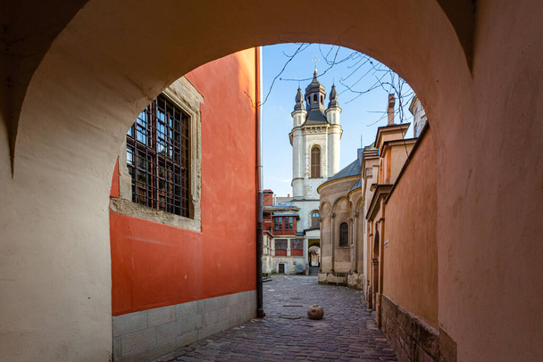 Lviv, Ukraine - April 4, 2020: Empty Lviv streets during COVID-19 Quarantine.  The Armenian Cathedral of the Assumption of Mary , armenian courtyard - 写真・画像