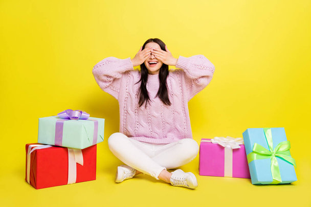 Full body photo of hooray young lady close eyes surprise party wear sweater pants isolated on yellow background - 写真・画像