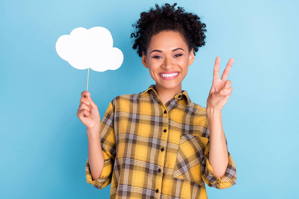 Photo of young african girl happy positive smile show peace v-sign paper cloud poster isolated over blue color background - Φωτογραφία, εικόνα