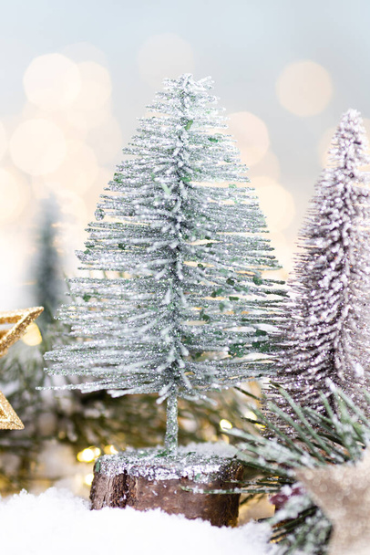 Christmas background with tree and blurred shiny lights. - Valokuva, kuva