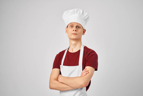 muž v kuchařské uniformě, pánev na smažení v rukou vaření - Fotografie, Obrázek