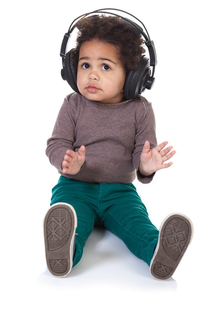 Little girl with headphones - 写真・画像