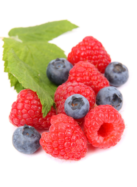 Ripe raspberry and Blueberries with leaf - Photo, Image