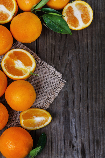 Wooden background with oranges - Photo, Image