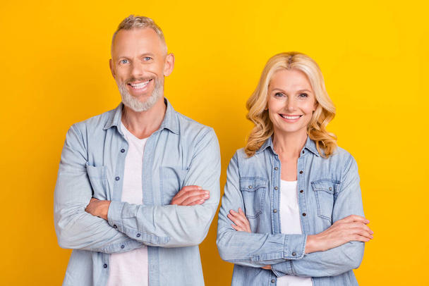 Photo of cheerful positive old wife husband crossed hands good mood smile enjoy isolated on yellow color background - Foto, Bild