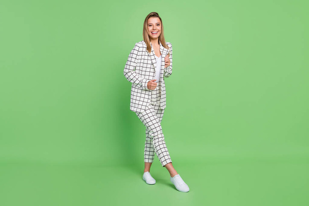 Full length body size view of attractive cheerful classy businesswoman posing having fun isolated over bright green color background - Foto, imagen
