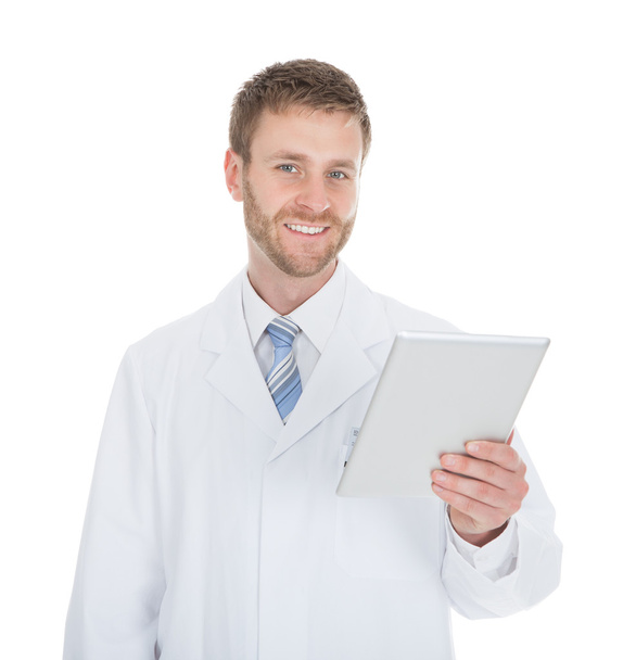 Male doctor using digital tablet - Fotó, kép