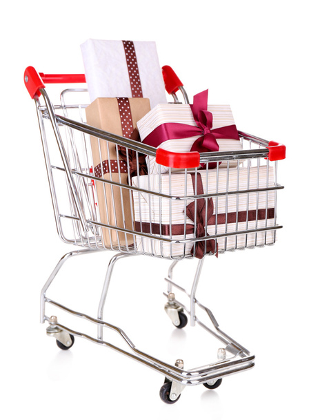 Many present boxes in shopping cart - Foto, afbeelding
