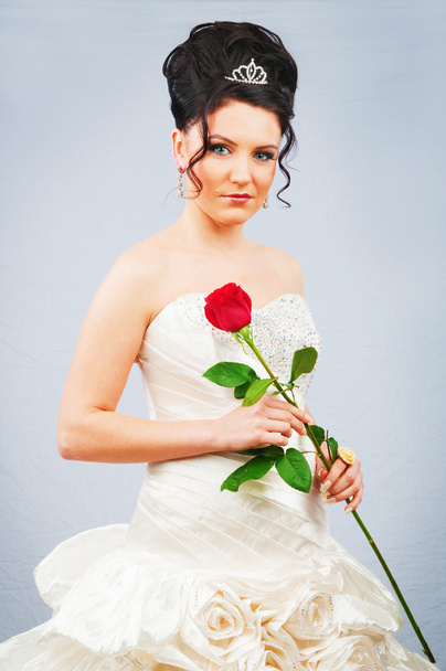Beautiful bride with rose in studio shooting - Zdjęcie, obraz