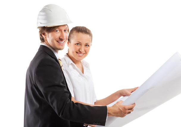 An architect wearing a hard hat and co-worker - Photo, Image